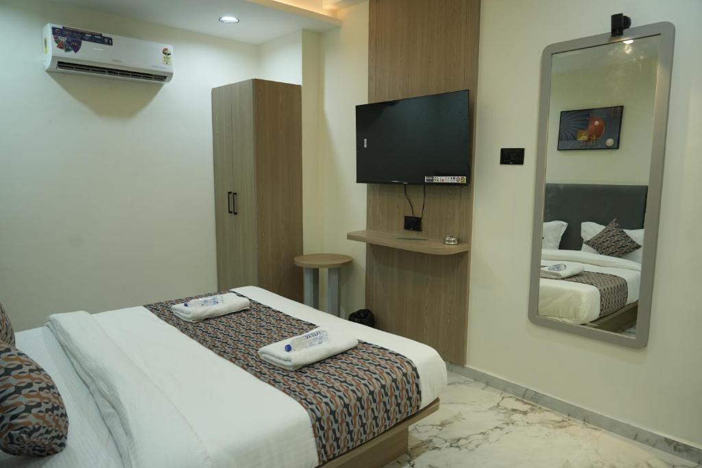 Postel nebo postele na pokoji v ubytování Hotel M Town
