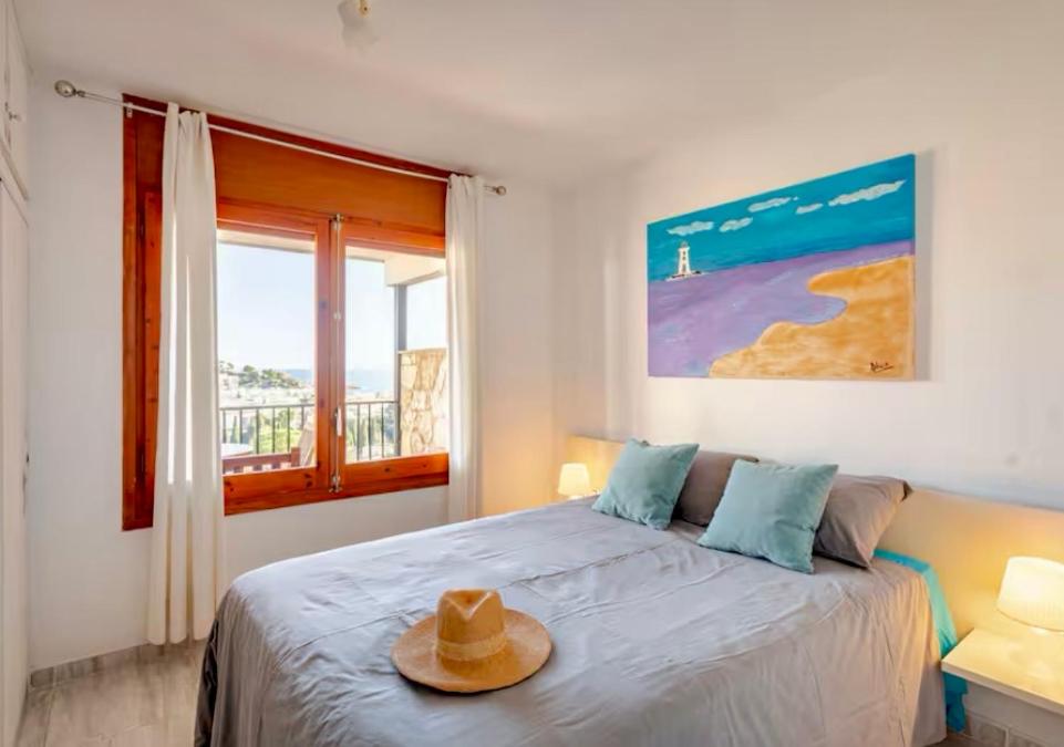 Ένα ή περισσότερα κρεβάτια σε δωμάτιο στο TOSSA DE MAR, MIRAMAR con piscina