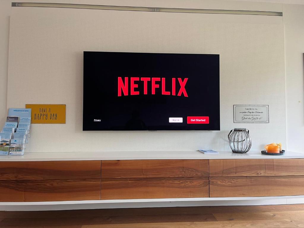 TV a/nebo společenská místnost v ubytování Buchtoase
