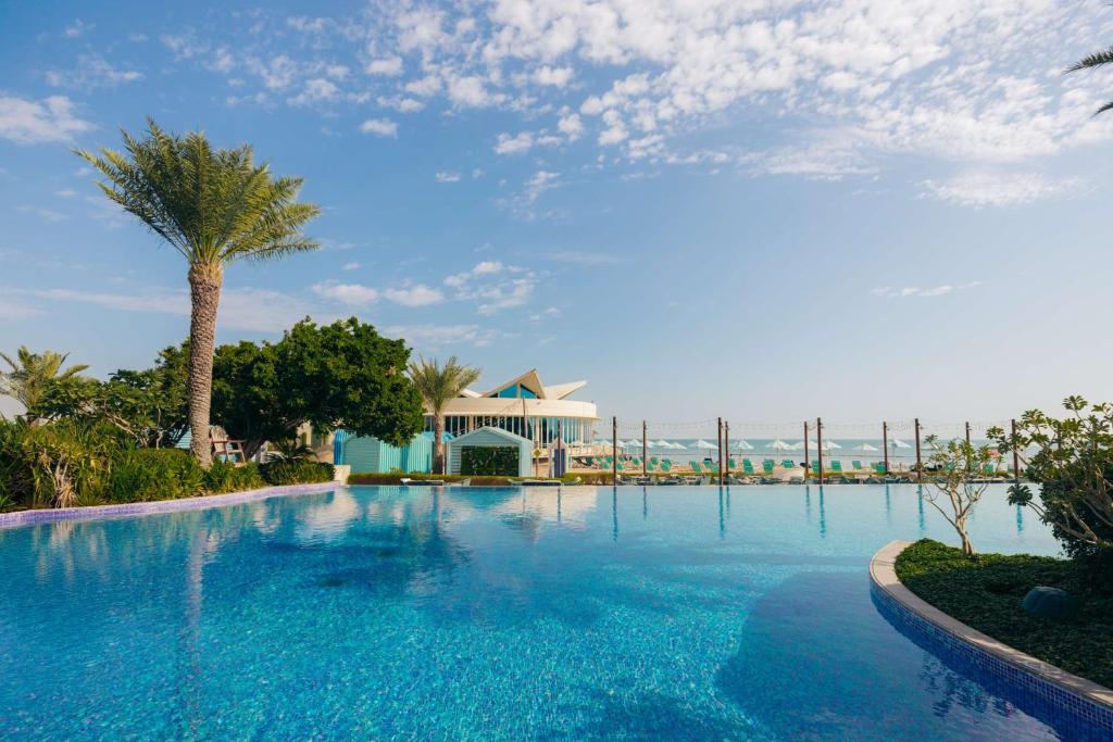 Bazén v ubytování Hilton Doha nebo v jeho okolí