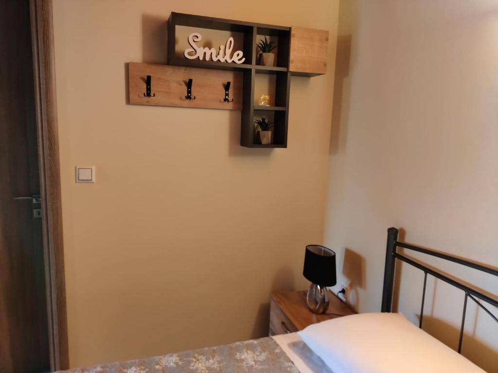 Posteľ alebo postele v izbe v ubytovaní Silver Pearl Apartment