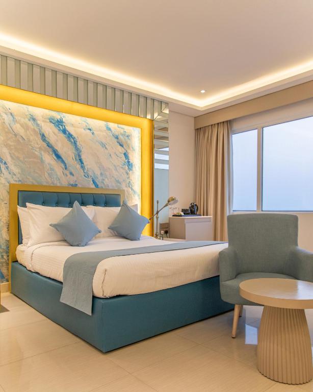 Postel nebo postele na pokoji v ubytování Marine Bay Colombo