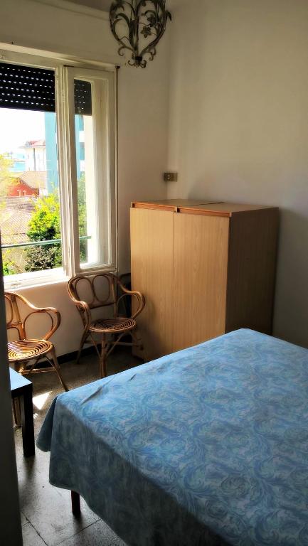 Postel nebo postele na pokoji v ubytování Hotel Villa Furia