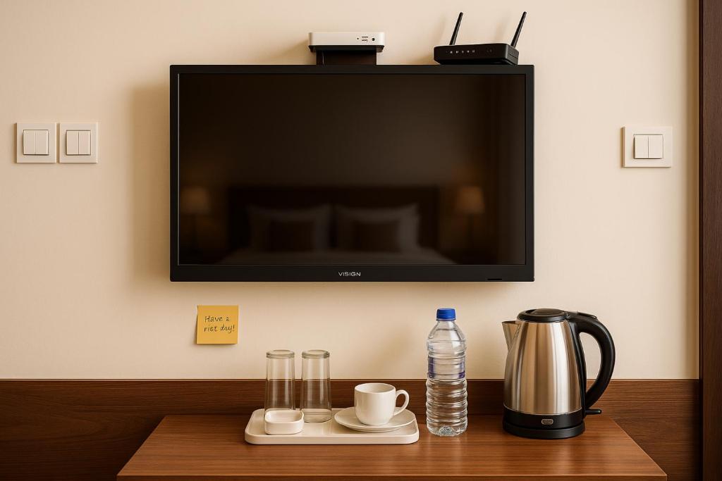 Příslušenství pro přípravu čaje a kávy v ubytování Hotel next home