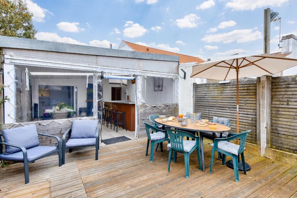 Et opholdsområde på Maison avec jardin pour 8 à 550m de la plage