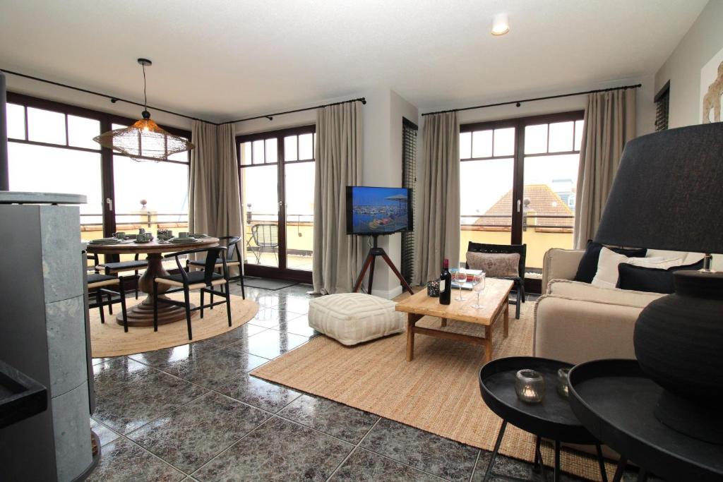 Televisyen dan/atau pusat hiburan di Hafen-Appartement Fritz