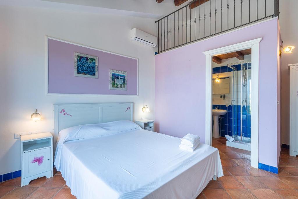 Postel nebo postele na pokoji v ubytování Al Palmento Relais