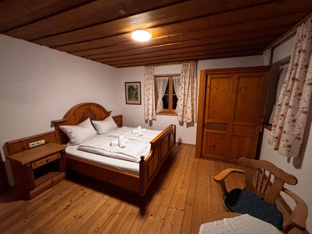 Postel nebo postele na pokoji v ubytování Ferienwohnungen Chiemgau