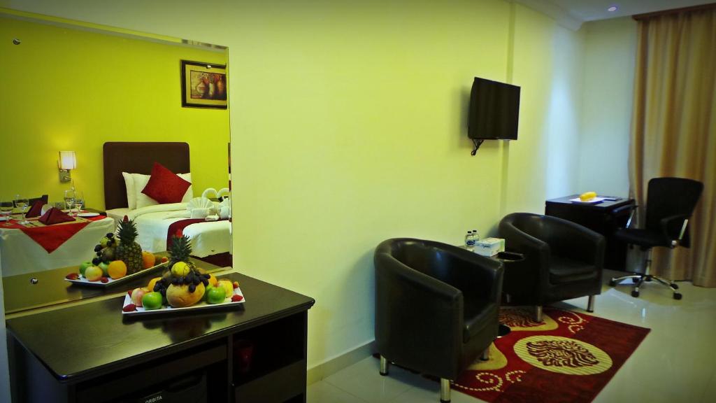 TV a/nebo společenská místnost v ubytování Mirage Hotel Al Aqah