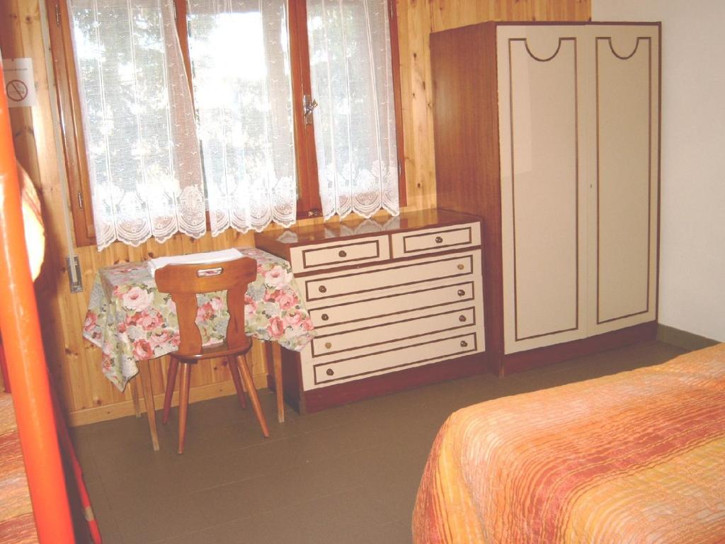 Postel nebo postele na pokoji v ubytování Albergo Tirolo