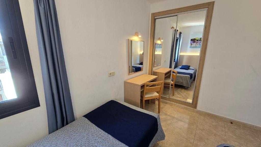 TV a/nebo společenská místnost v ubytování Marina Palmanova Apartamentos