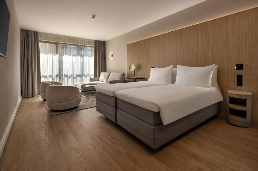 Postel nebo postele na pokoji v ubytování WestCord Hotel Eindhoven