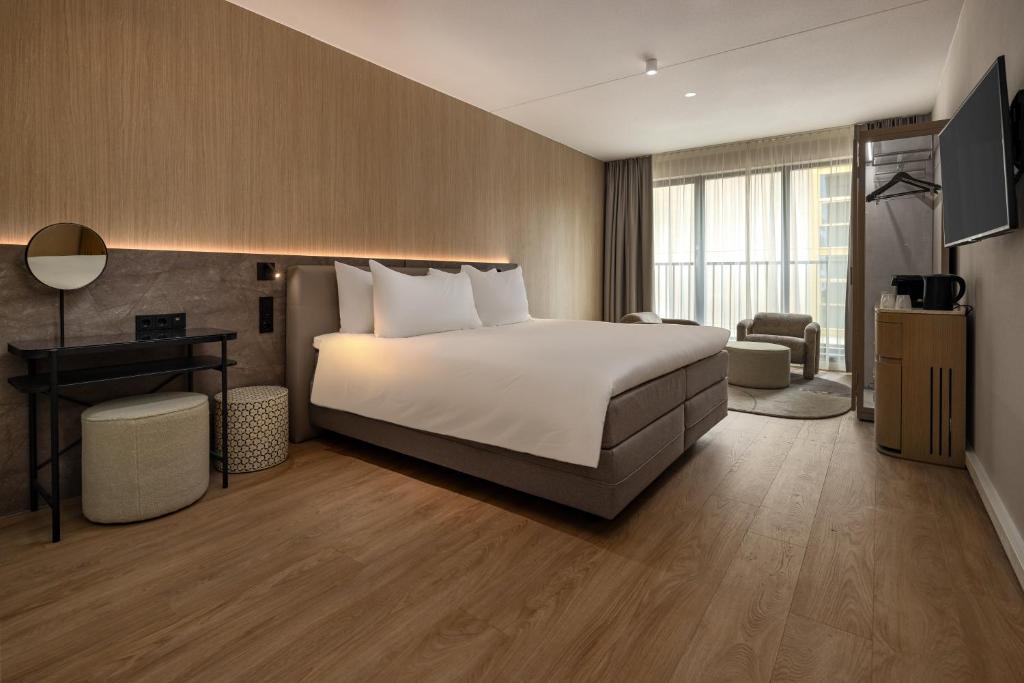 Postel nebo postele na pokoji v ubytování WestCord Hotel Eindhoven