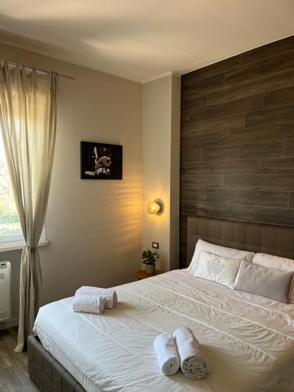 Postel nebo postele na pokoji v ubytování Garda Flow Holiday Home