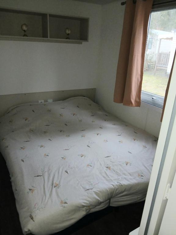 Postel nebo postele na pokoji v ubytování sweet mobil-home