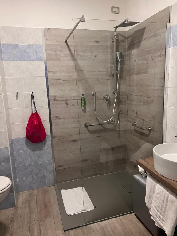 Koupelna v ubytování Hotel Canarino