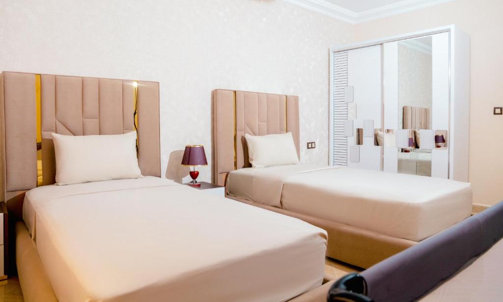 Postel nebo postele na pokoji v ubytování Residence Issrae 1