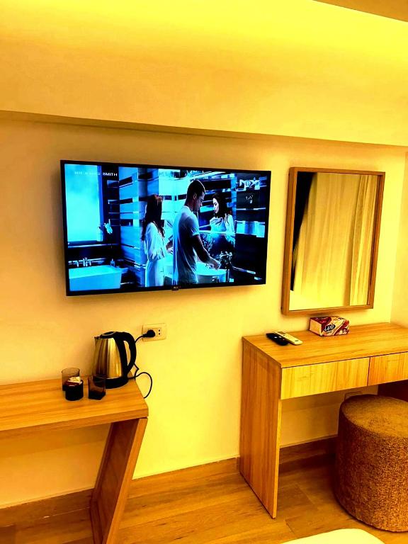TV a/nebo společenská místnost v ubytování The diamond pyramids hotel