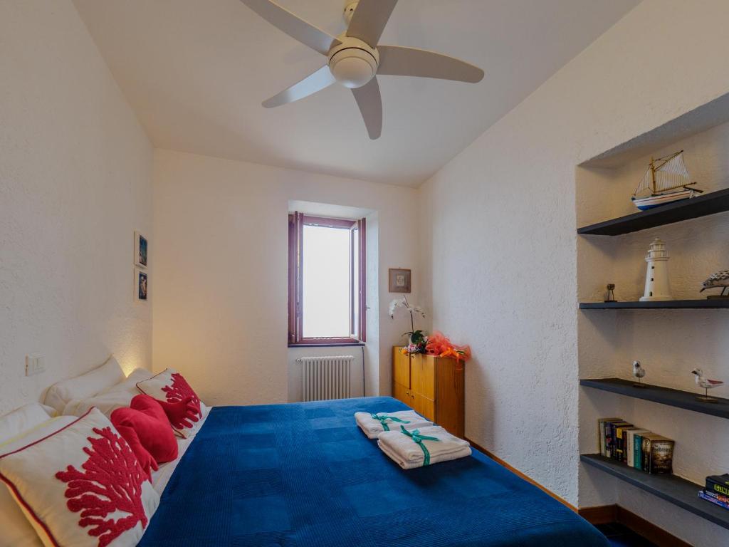 Postel nebo postele na pokoji v ubytování Il Baluardo Sea View Apartment on the Cliff