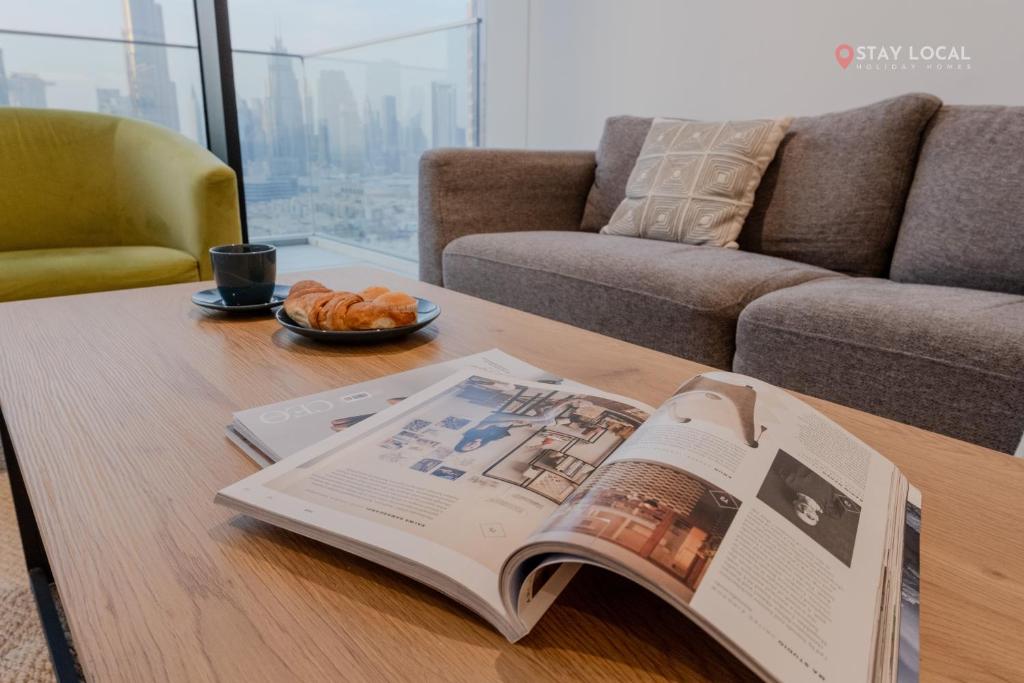 Posezení v ubytování Downtown Dreams I Cozy 2BR Getaway I Iconic Full Burj Khalifa Views I Near Dubai Mall