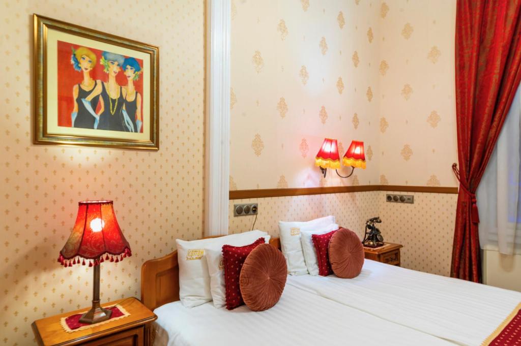 Postel nebo postele na pokoji v ubytování Cotton House Hotel Budapest