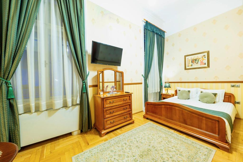 Postel nebo postele na pokoji v ubytování Cotton House Hotel Budapest