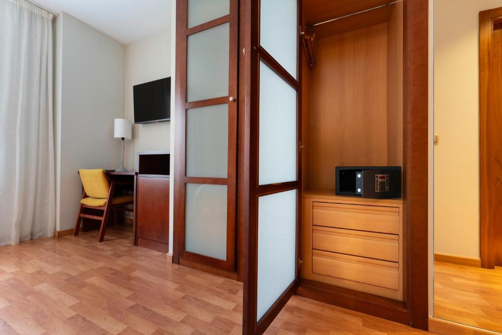 TV a/nebo společenská místnost v ubytování Hotel Doña Urraca