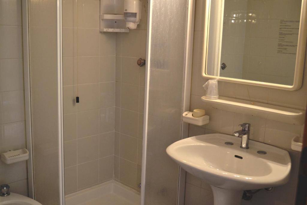 Koupelna v ubytování Hotel Quattro Palme