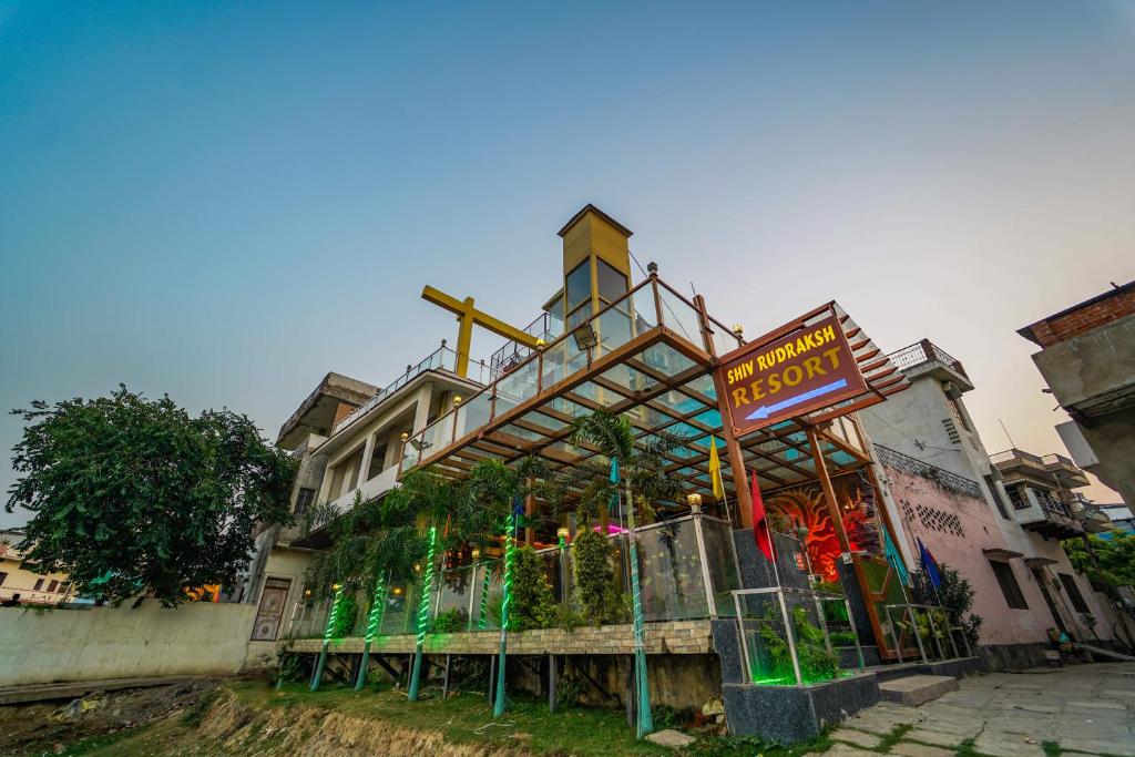 a building with a sign in front of it at Shiv Rudraksh Resort, Near Assi Ghat in Varanasi