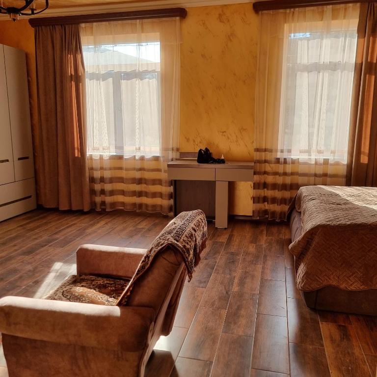 Postel nebo postele na pokoji v ubytování Alpha Rest House