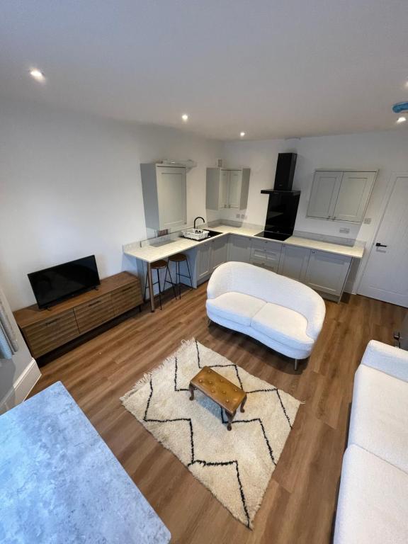 Et opholdsområde på Westbourne Alum Chine Loft apartment