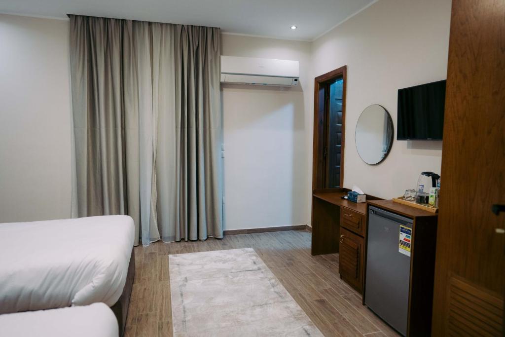 TV a/nebo společenská místnost v ubytování Florya pyramids Palace