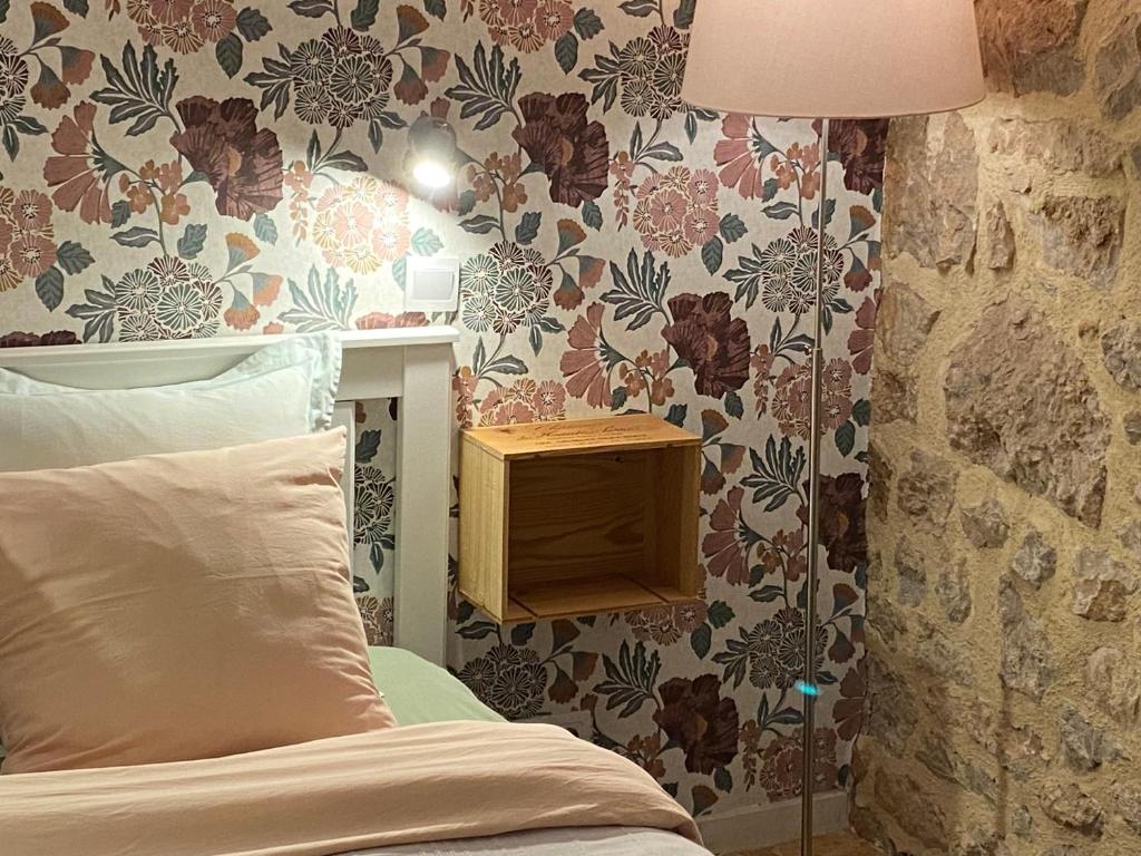 Postel nebo postele na pokoji v ubytování Chambre d'Hôtes les 3 Cochons d'Olt