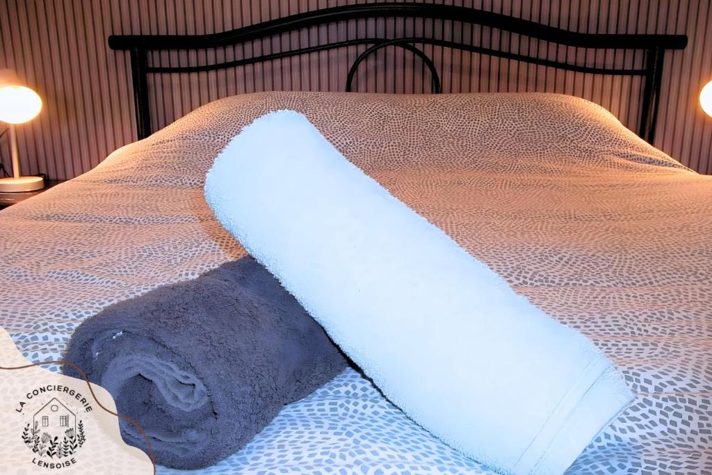 Postel nebo postele na pokoji v ubytování Le 101 de Serge
