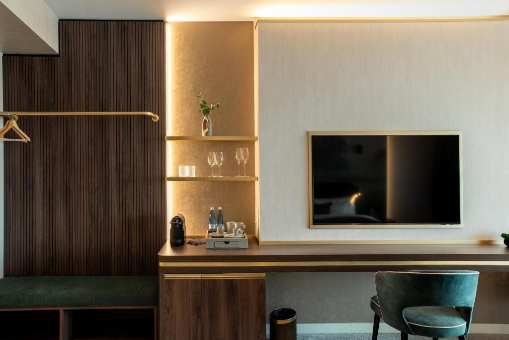 TV a/nebo společenská místnost v ubytování Le Primore Hotel & Spa