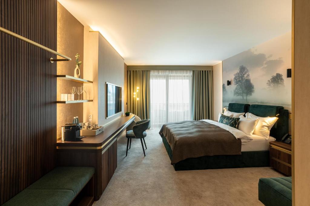 Postel nebo postele na pokoji v ubytování Le Primore Hotel & Spa
