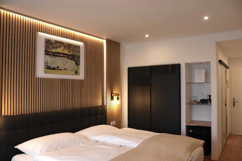 Postel nebo postele na pokoji v ubytování Hotel Europe