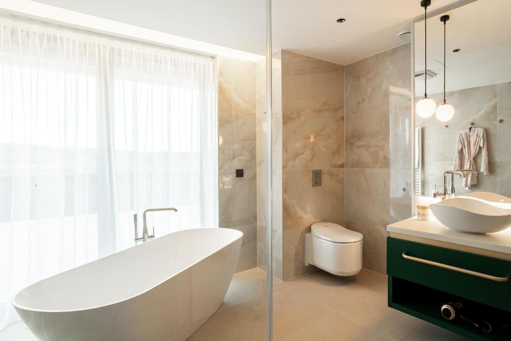 Koupelna v ubytování Le Primore Hotel & Spa