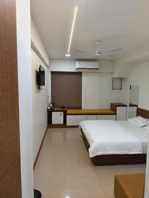 Postel nebo postele na pokoji v ubytování Hotel Spark Inn