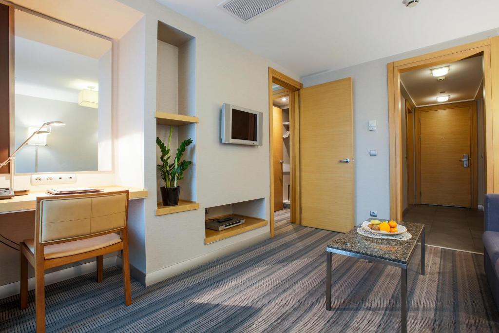 TV a/nebo společenská místnost v ubytování Housez Suites & Apartments Special Class