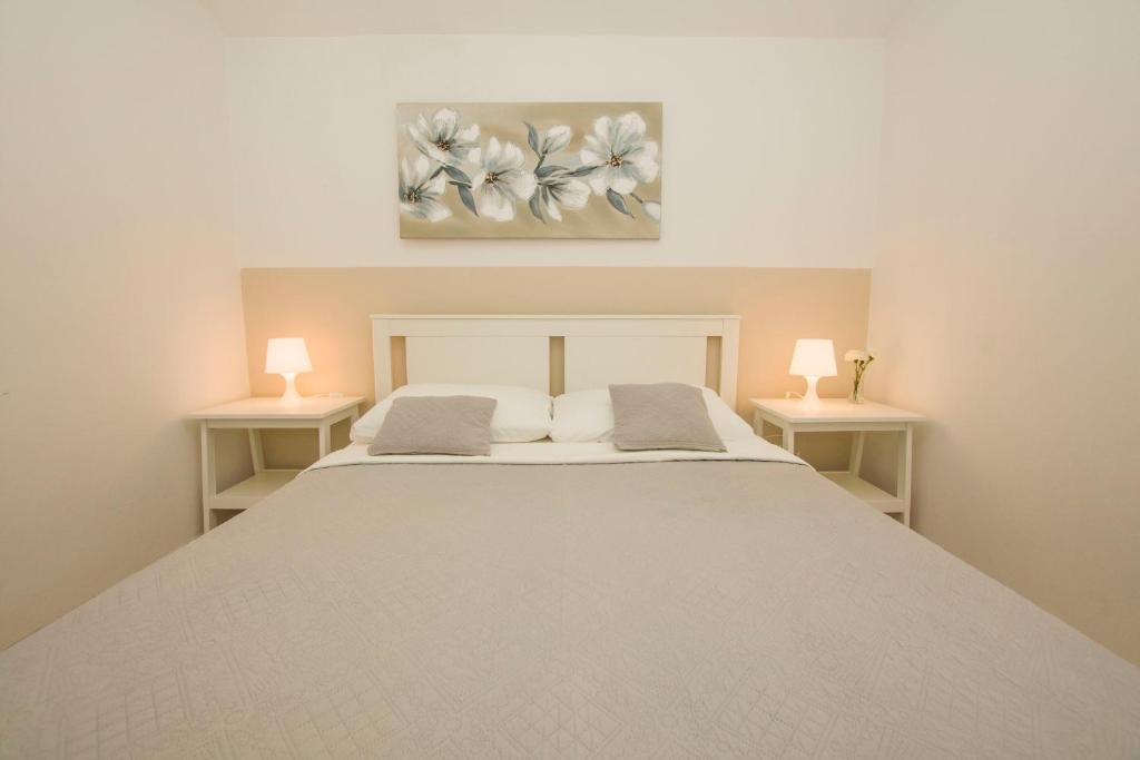 Posteľ alebo postele v izbe v ubytovaní Apartments Josip