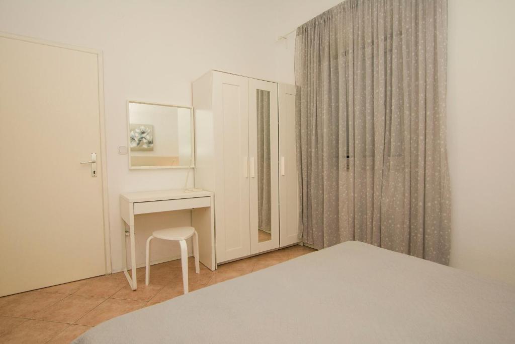 Posteľ alebo postele v izbe v ubytovaní Apartments Josip