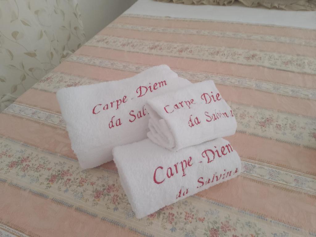 Postel nebo postele na pokoji v ubytování Carpe Diem da Salvina