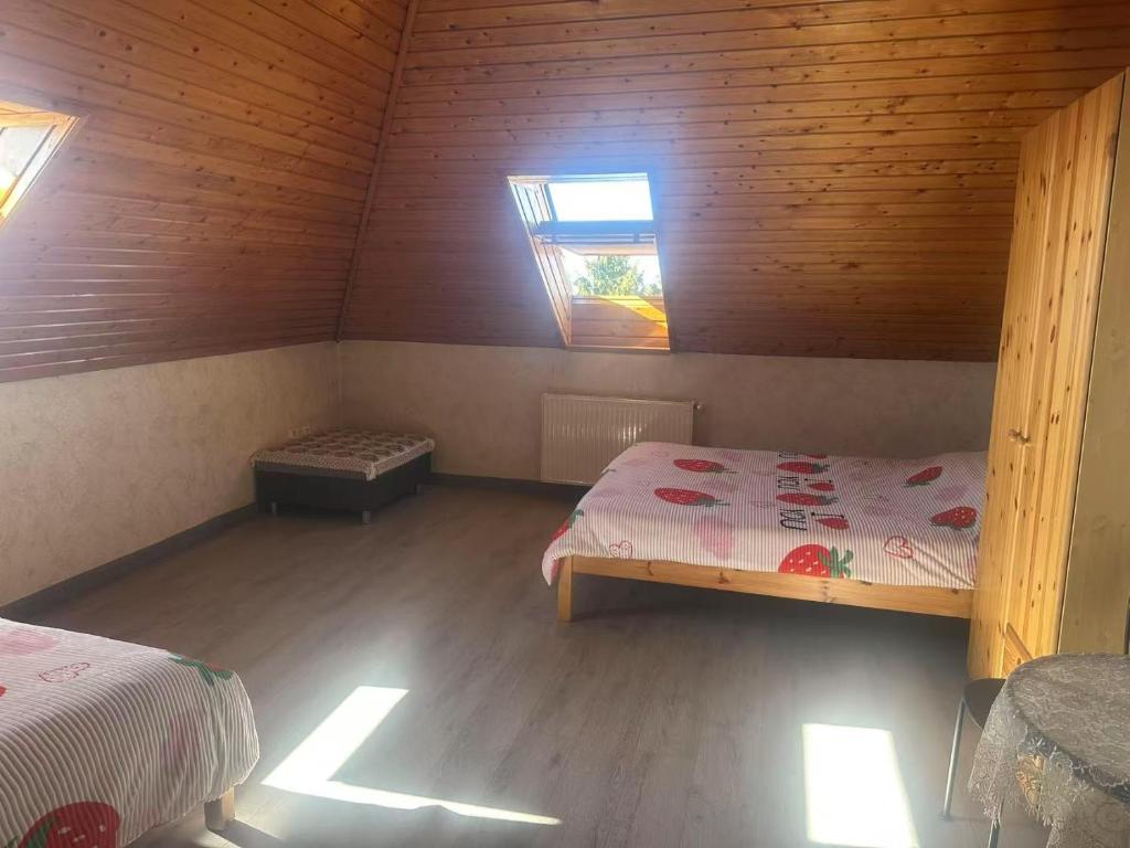 Postel nebo postele na pokoji v ubytování 苹果酒店