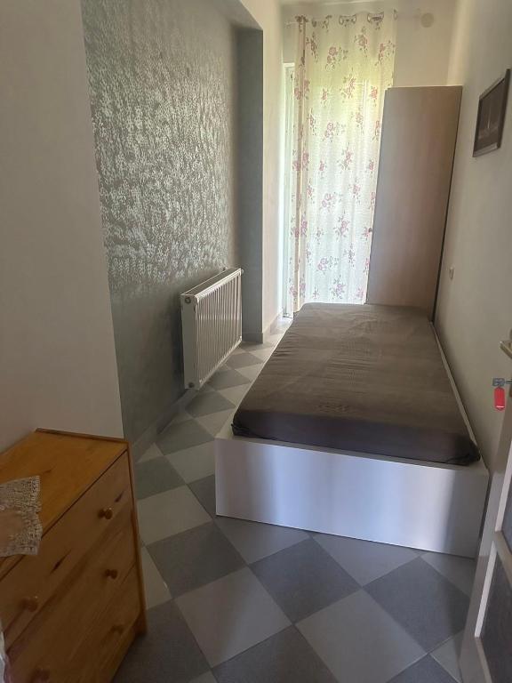 Postel nebo postele na pokoji v ubytování 苹果酒店