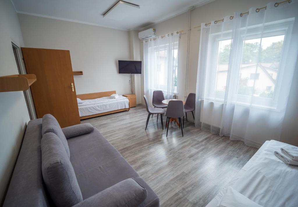 Postel nebo postele na pokoji v ubytování Meduza ośrodek wczasowy
