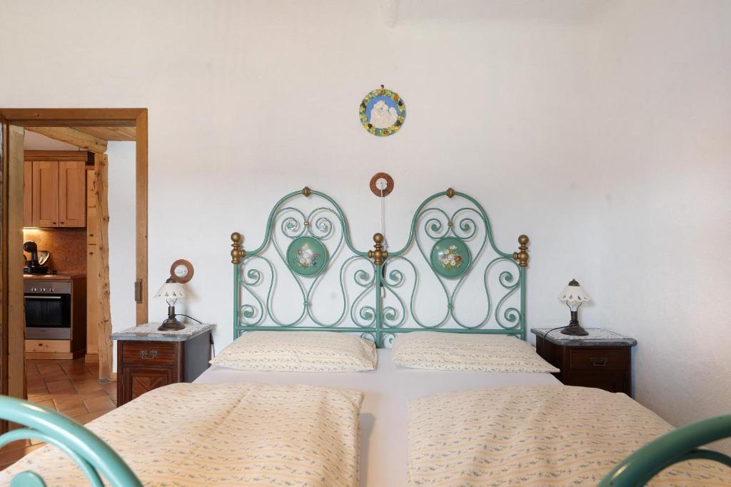 Postel nebo postele na pokoji v ubytování Agriturismo Alpenvidehof