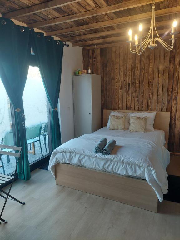 Postel nebo postele na pokoji v ubytování Le châtelain de Bouillon
