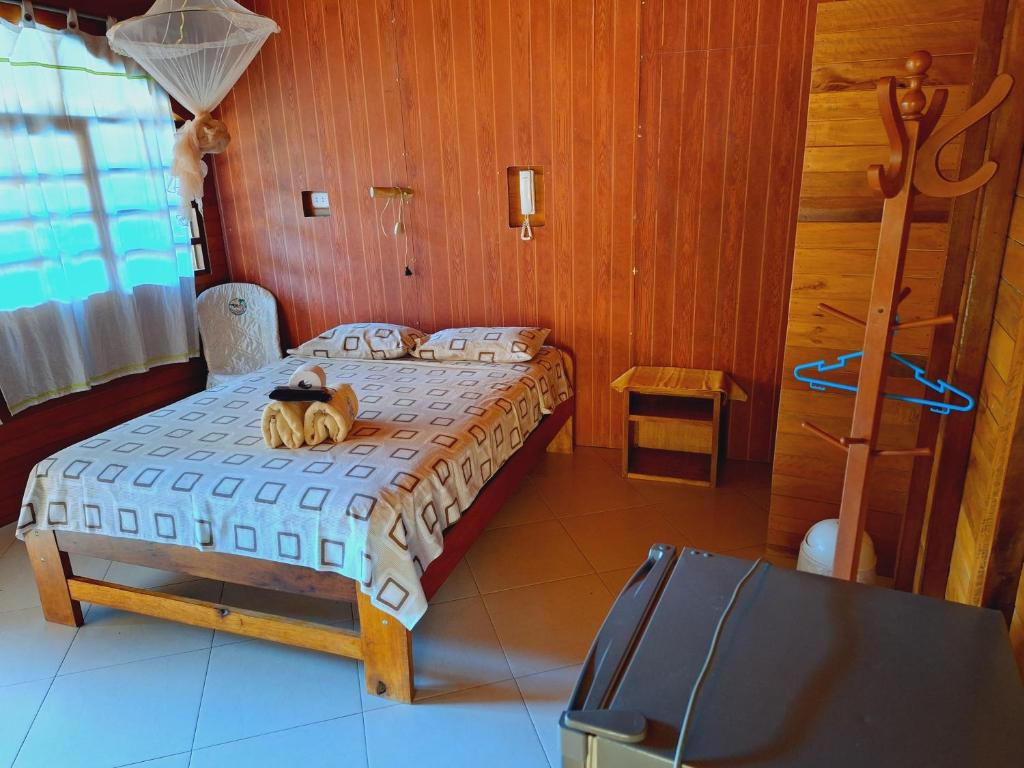 Postel nebo postele na pokoji v ubytování Madera Labrada Lodge Ecologico