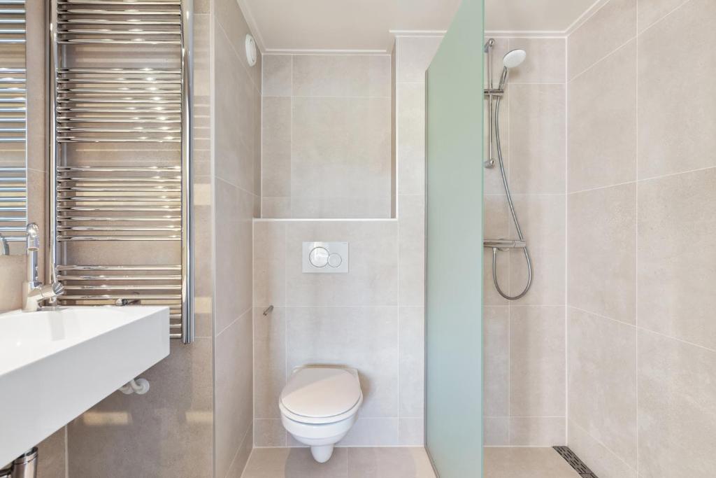 Koupelna v ubytování Strandhotel Zoutelande